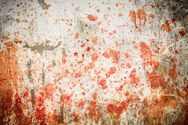 Concrete wall with blood splatters