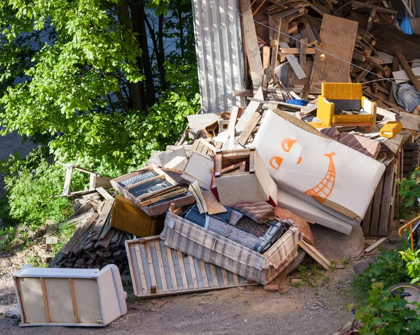 Funny broken furnitures trash pile