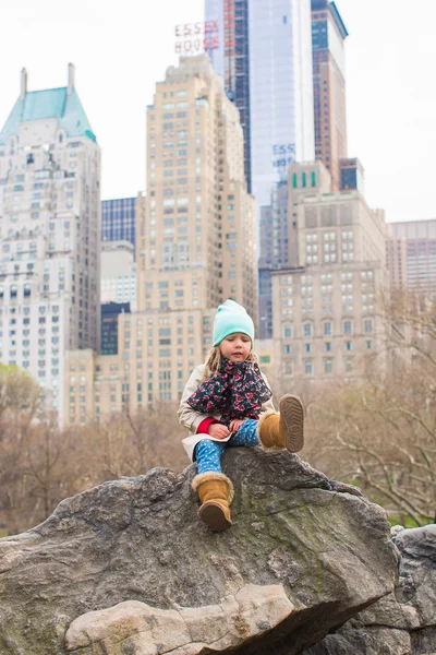 Adorable little girl in Central Park at New York City, America
