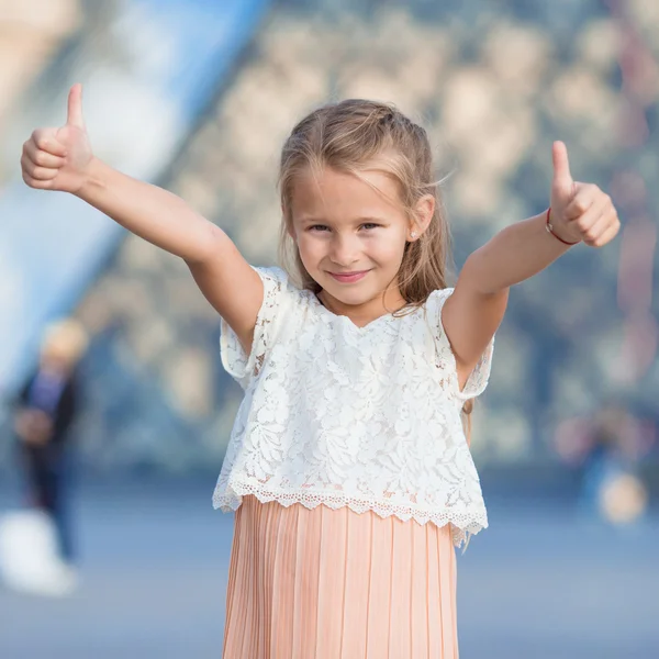 Adorable little girl during summer vacation in Paris