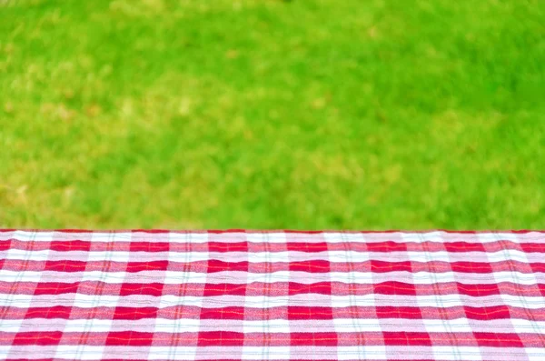 Picnic tablecloth on the table