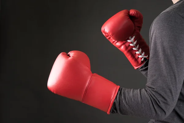 Businessman with boxing gloves .Photo for magazine ,or design wo