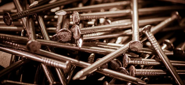 Carpenter long nails on a table