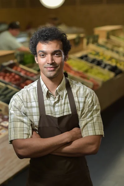 Portrait of Grocery clerk working in supermarket store