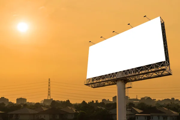 Blank billboard for advertisement with sunset in city