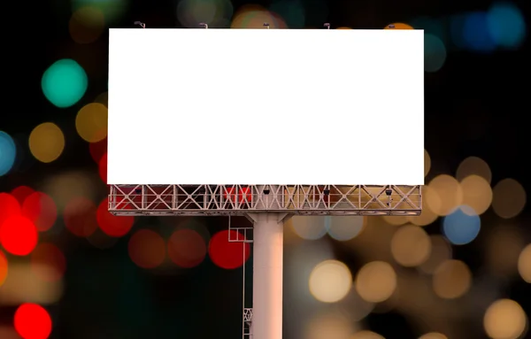 Blank billboard for advertisement on night time with bokeh backg