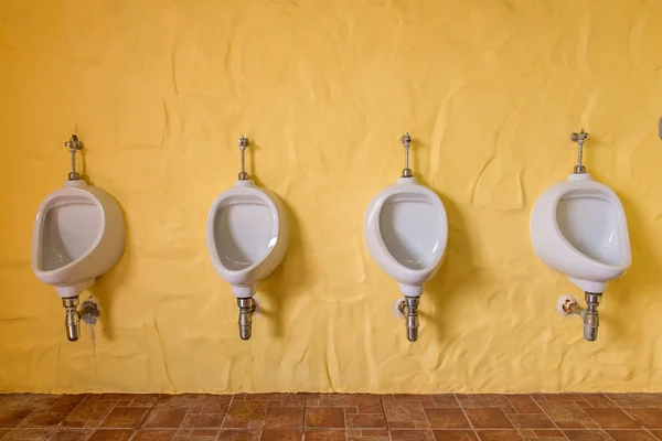 Urinals Men public in toilet room, wc.