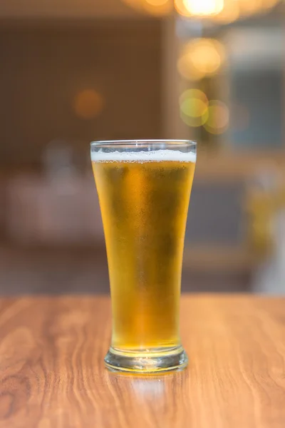 Glass of beer in pub and restaurant