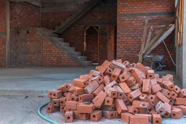 Group of red bricks Inside building with construction unfinished