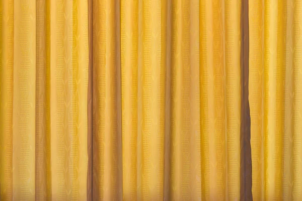 Yellow curtain fabric texture for background