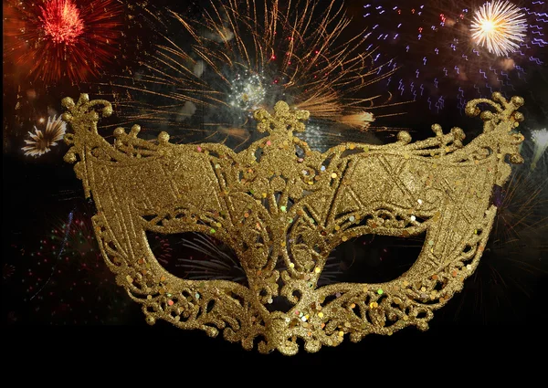 Masquerade mask on the background of fireworks