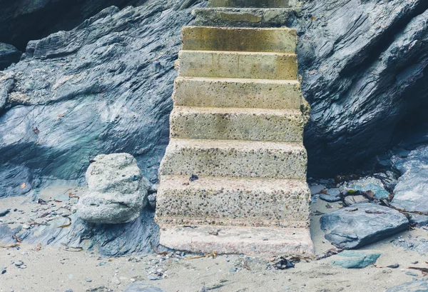 Concrete steps leading up cliff on coast
