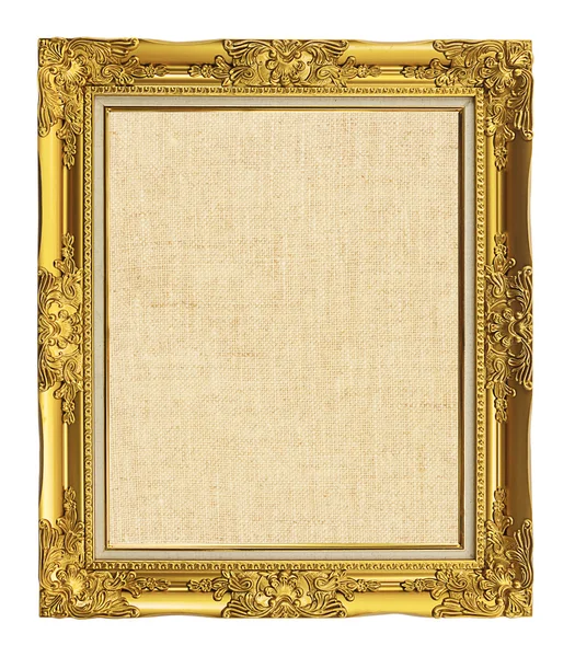 Old golden frame with empty grunge linen canvas for your picture