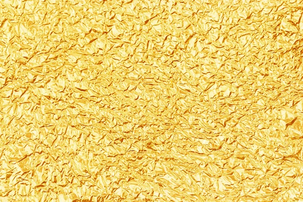 Shiny yellow leaf gold foil texture for background