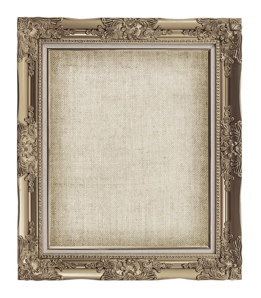 Old golden frame with empty grunge linen canvas for your picture