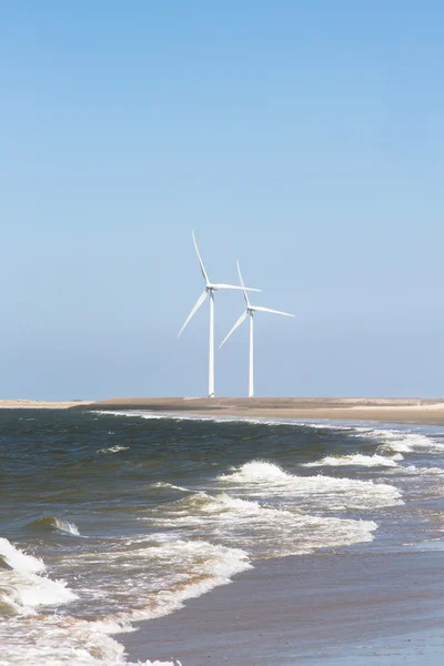 Sea in front of windturbines