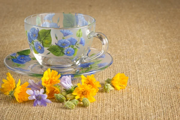 Mug for tea with blue and yellow flowers