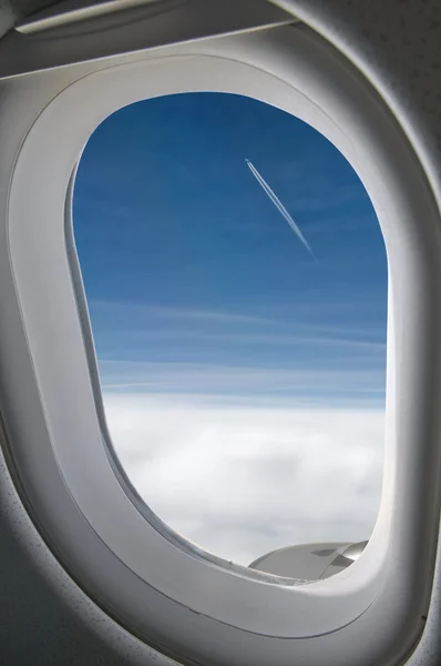 Trough a big jet plane window