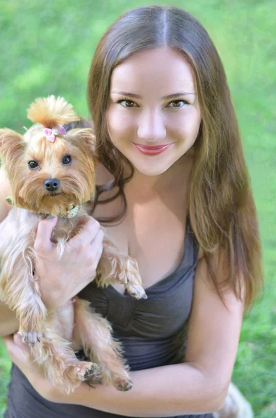 Woman with yorkshire terrier dog