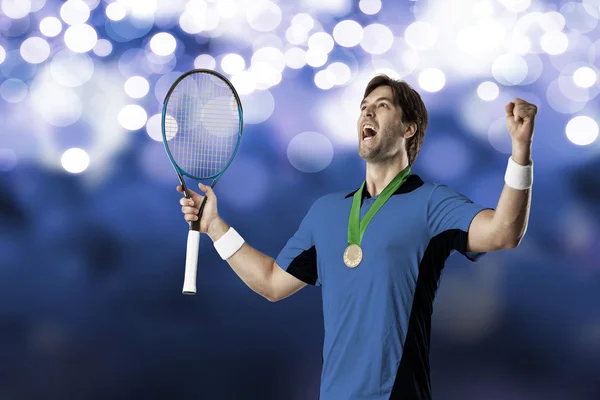 Tennis player with a blue shirt.