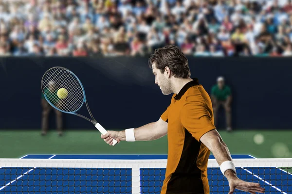 Tennis player with a orange shirt.
