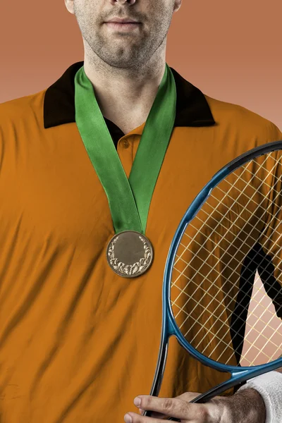 Tennis player with a orange shirt.