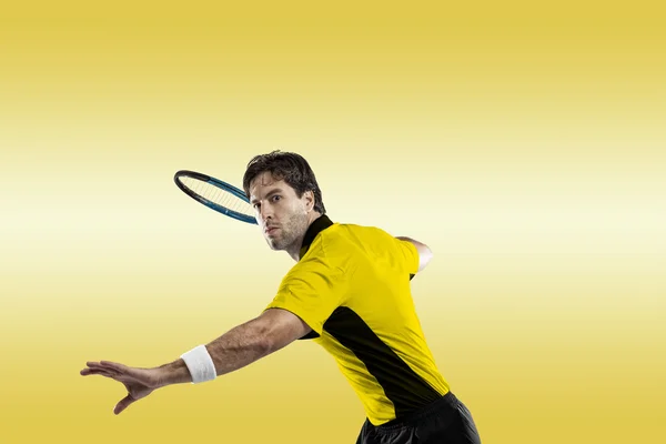 Tennis player with a yellow shirt.