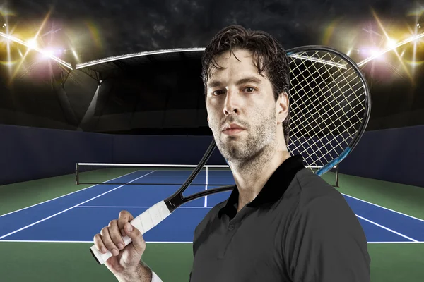 Tennis player with a black shirt.