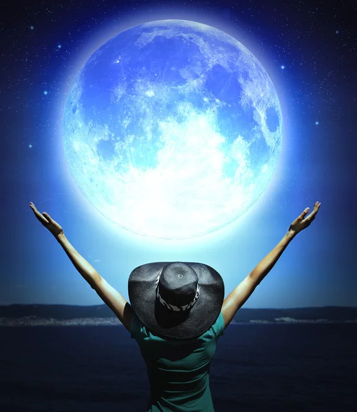 Woman and full moon