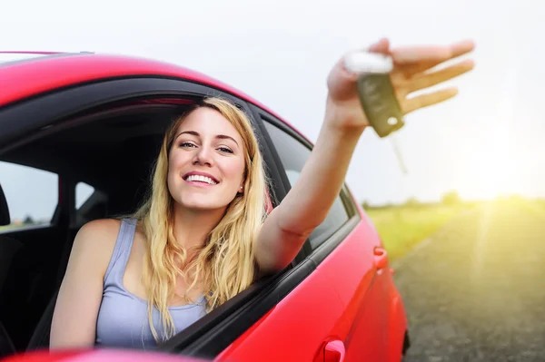 Woman showing keys.