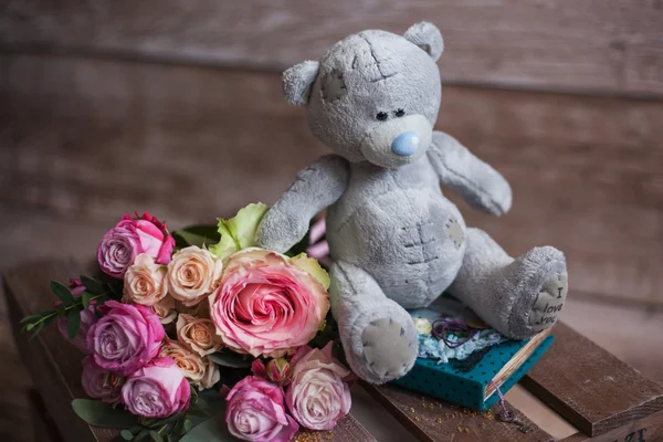 Teddy bear and roses