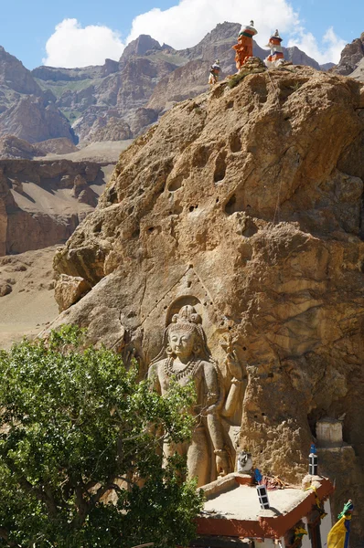 Striking enormous figure carved into the rock face of Maitreya B