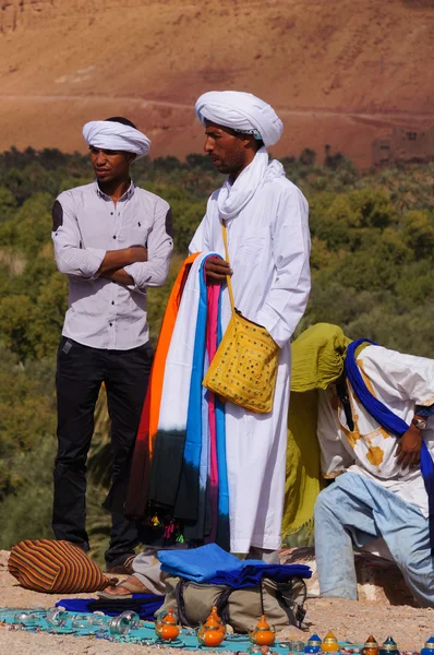 Unidentified men selling cloths at oasis in Tinghir,Morocco.