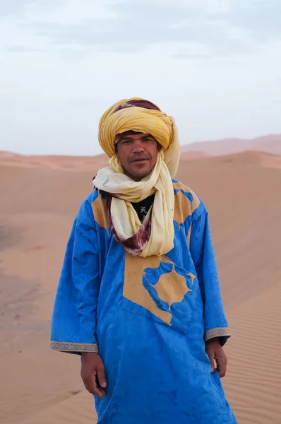Unidentified Bedouin waiting for tourist  in Sahara Desert,Moroc
