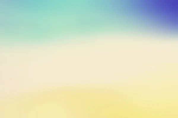 Abstract blurred textured background: yellow orange and blue pat