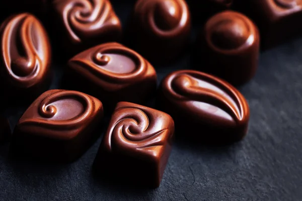 Delicious chocolate candies. Chocolates as background. Praline s