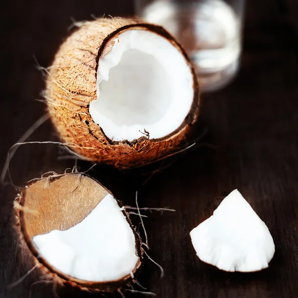 Fresh Coconut over wooden background