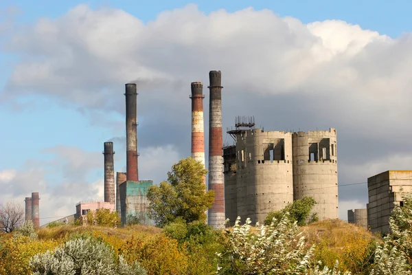 Smokestacks adversely affect the environment and the surrounding