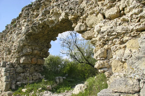 Remains of ancient arch bridge. Stone Bridge in the Crimea. Anci