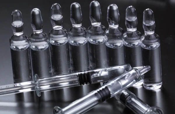 Medical ampoules on a black background