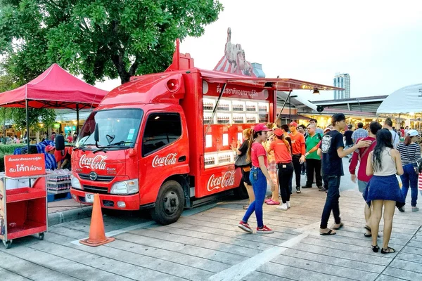 Coca Cola truck serving free coca cola