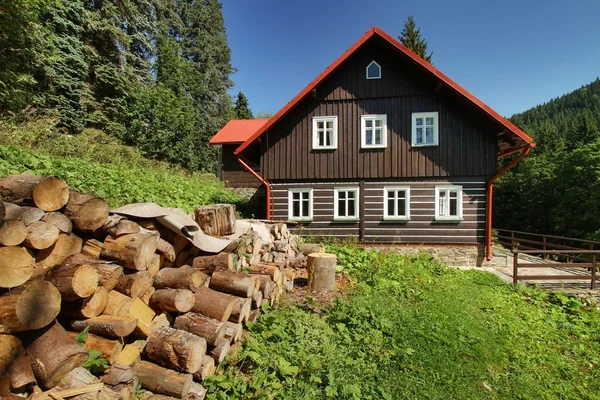 Mountain cottage with wood