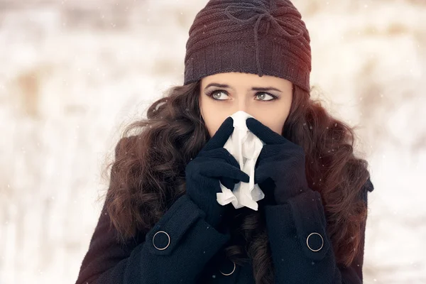 Woman with Tissue Outside Feeling Bad Cold Winter