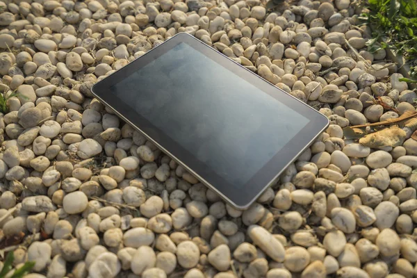 Digital tablet on stone