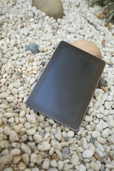 Digital tablet on stone