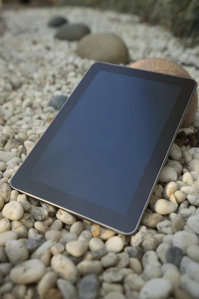 Digital tablet on stone