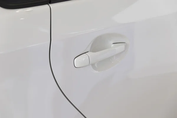 Door handle of new white car