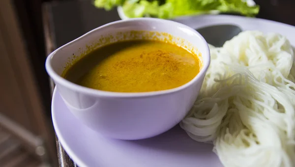 Rice vermicelli eaten with minced fish soup