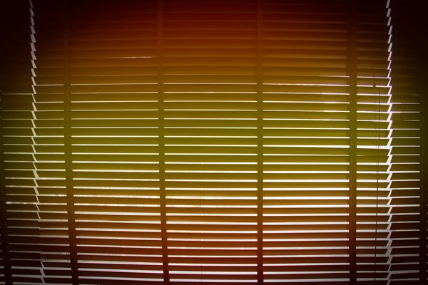Orange and yellow gradient with vignette on horizontal sun blind