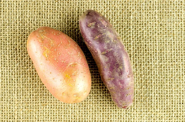 Red skinned potatoes and purple sweet potato